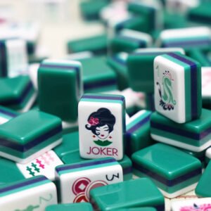 Green mahjong tiles with girl joker
